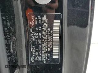 2013 Hyundai Genesis Coupe Grand Touring with VIN KMHHU6KJ7DU098549, listed as a Copart auction lot 57815265 with 115,763 mi miles and Salvage title. Bid and sale history available at DreamBid. Image 12.