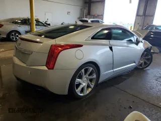 2014 Cadillac ELR z VIN 1G6RR1E47EU602170, wystawiony jako Copart lot #80667763 z przebiegiem Nie podano mil oraz Szkody całkowita. Historia ofert i sprzedaży dostępna na DreamBid. Obrazek 3.