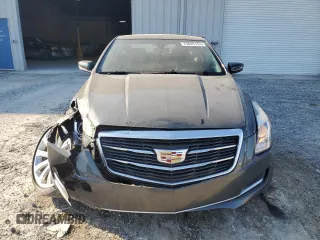 2015 Cadillac ATS Standard AWD z VIN 1G6AG1RX6F0123027, wystawiony jako Copart lot #75849154 z przebiegiem 40 857 mil mil oraz Szkoda całkowita • Salvage title. Historia ofert i sprzedaży dostępna na DreamBid. Obrazek 5.