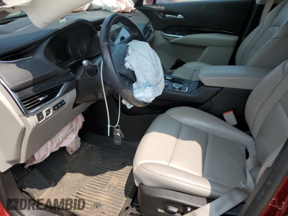 2019 Cadillac XT4 AWD Premium Luxury с VIN 1GYFZDR40KF149662, выставлен на аукционе Copart как лот 60366915 с пробегом 48 304 миль миль и Списание • Salvage title. История ставок и продаж доступна на DreamBid. Изображение 7.