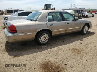 2003 Mercury Grand Marquis GS Convenience z VIN 2MEFM74WX3X619151, wystawiony jako Copart lot #55512335 z przebiegiem 101 627 mil mil oraz Szkoda całkowita • Salvage title. Historia ofert i sprzedaży dostępna na DreamBid. Obrazek 3.