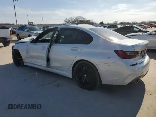 2022 BMW 3 Series 330i with VIN 3MW5R1J06N8C23668, listed as a Copart auction lot 47164585 with 0 mi miles and Salvage Title. Bid and sale history available at carsss.com. Image 2.