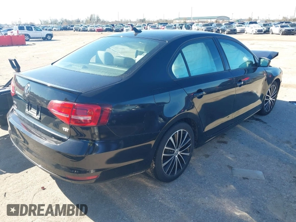 2015 Volkswagen Jetta SE z VIN 3VWD17AJ9FM415626, wystawiony jako IAAI lot #41309967 z przebiegiem 96 681 mil mil oraz . Historia ofert i sprzedaży dostępna na DreamBid. Obrazek 4.