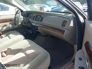 2005 Mercury Grand Marquis GS with VIN 2MEFM74W55X603152, listed as a IAAI auction lot 41872534 with 84,290 mi miles. Bid and sale history available at carsss.com. Image 5.
