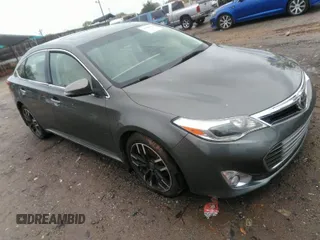 2014 Toyota Avalon Limited with VIN 4T1BK1EBXEU109256, listed as a IAAI auction lot 41908504 with 84,472 mi miles. Bid and sale history available at carsss.com. Image 1.