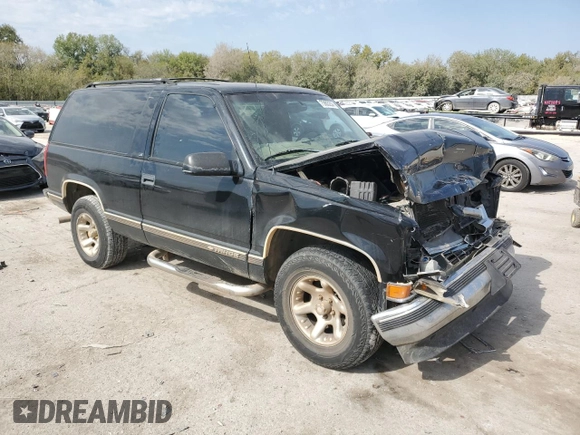 1999 Chevrolet Tahoe z VIN 3GNEC18R3XG165012, wystawiony jako Copart lot #75803204 z przebiegiem 227 608 mil mil oraz Szkoda całkowita • Salvage title. Historia ofert i sprzedaży dostępna na DreamBid. Obrazek 4.