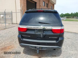 2013 Dodge Durango Citadel z VIN 1C4RDHEG7DC562546, wystawiony jako IAAI lot #42311942 z przebiegiem 286 411 mil mil oraz . Historia ofert i sprzedaży dostępna na DreamBid. Obrazek 16.