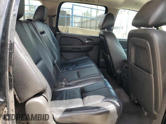 2014 Chevrolet Suburban LT with VIN 1GNSKJE77ER193143, listed as a Copart auction lot 54311935 with 171,407 mi miles and Salvage Title. Bid and sale history available at DreamBid. Image 11.