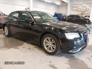 2016 Chrysler 300 Anniversary Edition with VIN 2C3CCAAG1GH343836, listed as a IAAI auction lot 41562296 with 120,665 mi miles and . Bid and sale history available at DreamBid. Image 1.