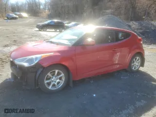2012 Hyundai Veloster w/Gray Int with VIN KMHTC6AD3CU051557, listed as a Copart auction lot 49773565 with 92,190 mi miles and Salvage Title. Bid and sale history available at carsss.com. Image 1.