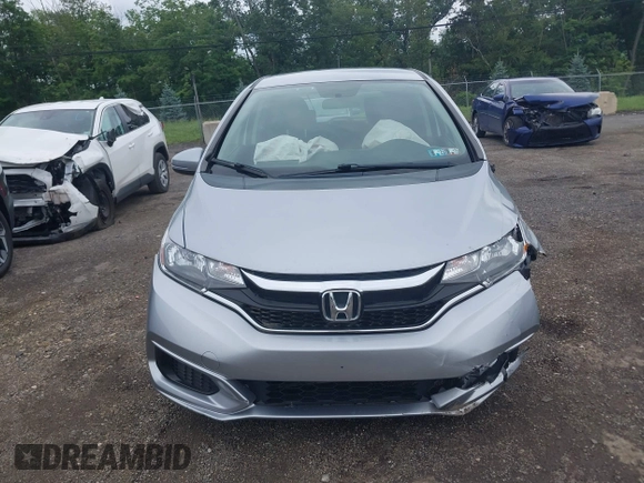 2019 Honda Fit LX z VIN 3HGGK5H45KM725916, wystawiony jako IAAI lot #42654907 z przebiegiem 92 580 mil mil oraz . Historia ofert i sprzedaży dostępna na DreamBid. Obrazek 12.