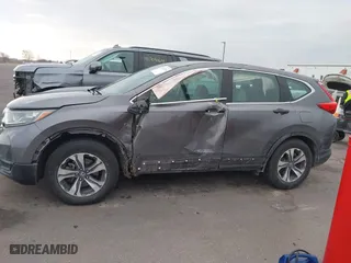 2017 Honda CR-V LX with VIN 7FARW5H32HE002156, listed as a IAAI auction lot 41697635 with 68,125 mi miles. Bid and sale history available at carsss.com. Image 14.