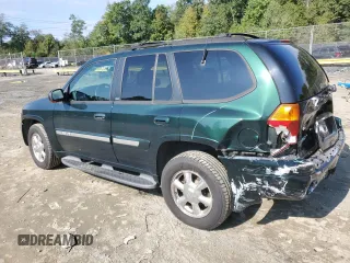 2003 GMC Envoy SLT with VIN 1GKDT13S032396374, listed as a Copart auction lot 74675134 with 115,280 mi miles and Salvage Title. Bid and sale history available at carsss.com. Image 2.