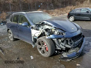 2012 Porsche Cayenne Turbo z VIN WP1AC2A29CLA83629, wystawiony jako Copart lot #83067994 z przebiegiem Nie podano mil oraz Szkoda całkowita • Salvage title. Historia ofert i sprzedaży dostępna na DreamBid. Obrazek 4.