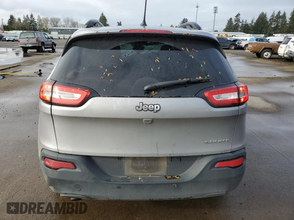 2016 Jeep Cherokee Sport with VIN 1C4PJLAB0GW189379, listed as a Copart auction lot 52239555 with 142,699 mi miles and Salvage title. Bid and sale history available at DreamBid. Image 6.