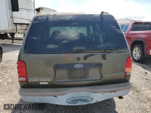 2001 Ford Explorer Sport z VIN 1FMYU60E31UA70006, wystawiony jako Copart lot #56430155 z przebiegiem 194 924 mil mil oraz Czysty tytuł • Clean title. Historia ofert i sprzedaży dostępna na DreamBid. Obrazek 6.