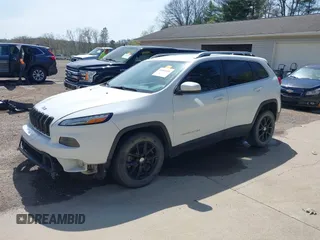 2015 Jeep Cherokee Latitude with VIN 1C4PJLCS3FW670254, listed as a IAAI auction lot 42060659 with 164,291 mi miles. Bid and sale history available at carsss.com. Image 22.