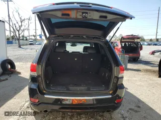 2019 Jeep Grand Cherokee Overland with VIN 1C4RJECG5KC602873, listed as a Copart auction lot 46701925 with 96,444 mi miles and Salvage Title. Bid and sale history available at carsss.com. Image 6.
