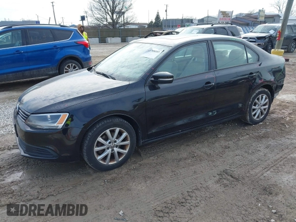 2012 Volkswagen Jetta Sedan SE w/Convenience with VIN 3VWDX7AJ5CM398348, listed as a IAAI auction lot 41708085 with 147,477 mi miles. Bid and sale history available at carsss.com. Image 2.