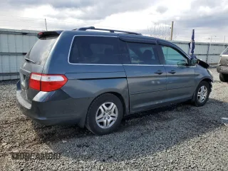 2006 Honda Odyssey EX-L with VIN 5FNRL38706B415413, listed as a Copart auction lot 50725115 with 180,010 mi miles and Salvage Title. Bid and sale history available at carsss.com. Image 3.