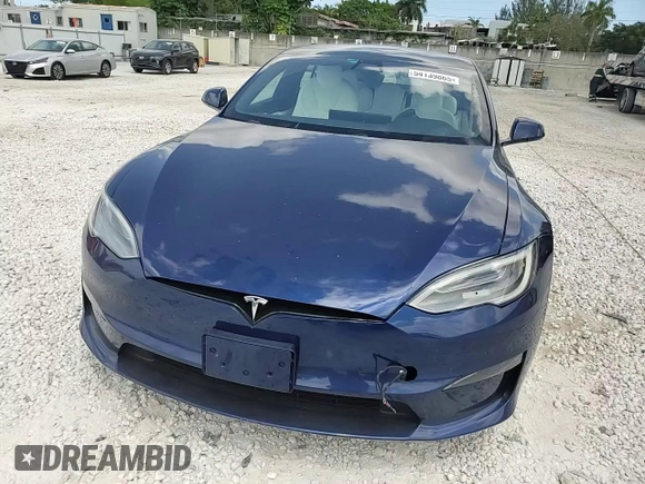 2021 Tesla Model S Long Range с VIN 5YJSA1E50MF452893, выставлен на аукционе Copart как лот 54139865 с пробегом 56 410 миль миль и Списание • Salvage title. История ставок и продаж доступна на DreamBid. Изображение 14.