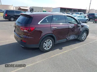 2019 Kia Sorento LX z VIN 5XYPG4A58KG565461, wystawiony jako IAAI lot #42099618 z przebiegiem 42 574 mil mil oraz . Historia ofert i sprzedaży dostępna na DreamBid. Obrazek 4.