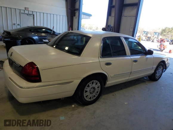 2006 Mercury Grand Marquis GS z VIN 2MEFM74V96X621050, wystawiony jako Copart lot #49098465 z przebiegiem 75 561 mil mil oraz Szkoda całkowita • Salvage title. Historia ofert i sprzedaży dostępna na DreamBid. Obrazek 3.