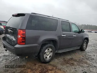 2010 Chevrolet Suburban LS with VIN 1GNUCHE0XAR246347, listed as a Copart auction lot 43145465 with 219,584 mi miles and Salvage Title. Bid and sale history available at carsss.com. Image 3.