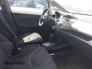 2011 Honda Fit Sport with VIN JHMGE8H50BC003110, listed as a IAAI auction lot 42210062 with 185,571 mi miles and . Bid and sale history available at DreamBid. Image 5.