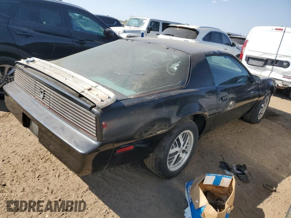 1982 Pontiac Firebird z VIN 1G2AW87H4CL566862, wystawiony jako Copart lot #74777384 z przebiegiem 597 058 mil mil oraz Czysty tytuł • Clean title. Historia ofert i sprzedaży dostępna na DreamBid. Obrazek 3.