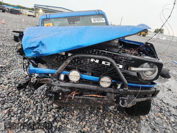 2021 Ford Bronco z VIN 1FMEE5DPXMLB01431, wystawiony jako Copart lot #59192915 z przebiegiem Nie podano mil oraz Nie do naprawy • Non repairable. Historia ofert i sprzedaży dostępna na DreamBid. Obrazek 5.