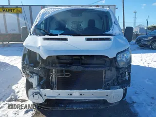 2019 Ford Transit with VIN 1FTYE1YM7KKA23171, listed as a IAAI auction lot 41260744 with 114,715 mi miles and . Bid and sale history available at DreamBid. Image 6.