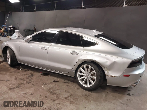 2012 Audi A7 z VIN WAUWGCFC2CN091270, wystawiony jako IAAI lot #41261927 z przebiegiem 109 756 mil mil oraz . Historia ofert i sprzedaży dostępna na DreamBid. Obrazek 6.