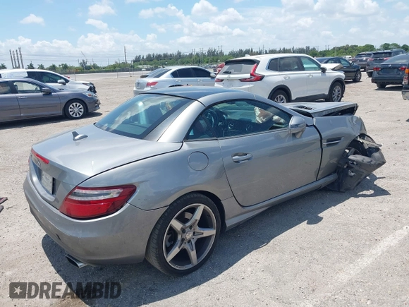 2014 Mercedes-Benz SLK 250 with VIN WDDPK4HA7EF092618, listed as a IAAI auction lot 42150470 with 52,727 mi miles and . Bid and sale history available at DreamBid. Image 4.
