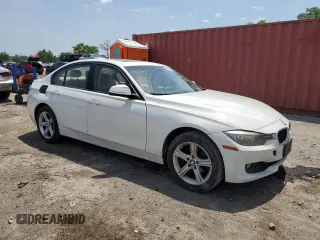 2013 BMW 3 Series 328i with VIN WBA3A5G58DNP21035, listed as a Copart auction lot 60543305 with 151,768 mi miles and Salvage title. Bid and sale history available at DreamBid. Image 4.
