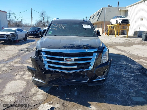 2017 Cadillac Escalade Premium Luxury with VIN 1GYS4CKJXHR133970, listed as a IAAI auction lot 41666038 with 100,269 mi miles. Bid and sale history available at carsss.com. Image 12.