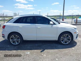 2016 Audi Q3 Prestige with VIN WA1GFCFS9GR022778, listed as a IAAI auction lot 41986610 with 14,508 mi miles. Bid and sale history available at carsss.com. Image 13.
