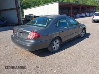 2005 Ford Taurus SE with VIN 1FAFP532X5A272398, listed as a IAAI auction lot 42001798 with 159,199 mi miles. Bid and sale history available at carsss.com. Image 4.