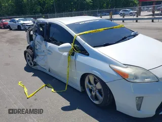 2013 Toyota Prius One z VIN JTDKN3DU9D5595786, wystawiony jako IAAI lot #42136885 z przebiegiem 157 576 mil mil oraz . Historia ofert i sprzedaży dostępna na DreamBid. Obrazek 1.
