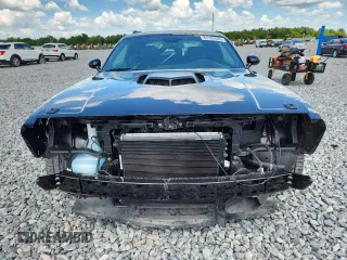 2023 Dodge Challenger R/T Scat Pack Widebody z VIN 2C3CDZFJ3PH596415, wystawiony jako Copart lot #61161035 z przebiegiem 10 317 mil mil oraz Szkoda całkowita • Salvage title. Historia ofert i sprzedaży dostępna na DreamBid. Obrazek 5.