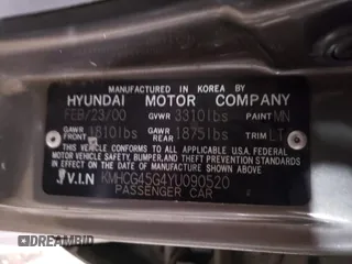 2000 Hyundai Accent z VIN KMHCG45G4YU090520, wystawiony jako Copart lot #79705864 z przebiegiem 145 490 mil mil oraz Szkoda całkowita • Salvage title. Historia ofert i sprzedaży dostępna na DreamBid. Obrazek 12.