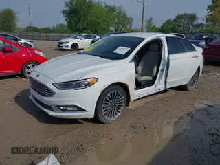 2018 Ford Fusion Titanium with VIN 3FA6P0RU2JR246812, listed as a IAAI auction lot 42157030 with 168,680 mi miles and . Bid and sale history available at DreamBid. Image 18.