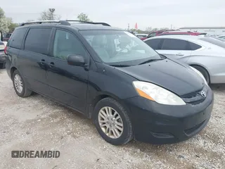2009 Toyota Sienna XLE with VIN 5TDZK22C09S225520, listed as a IAAI auction lot 42126813 with 217,573 mi miles. Bid and sale history available at carsss.com. Image 1.
