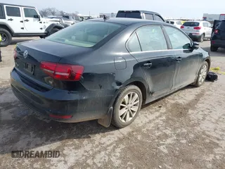 2016 Volkswagen Jetta Sedan 1.4T SE with VIN 3VWD67AJ3GM390273, listed as a IAAI auction lot 41575074 with 114,705 mi miles. Bid and sale history available at carsss.com. Image 4.