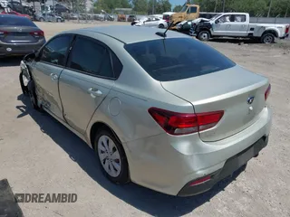2018 Kia Rio LX with VIN 3KPA24AB2JE137858, listed as a IAAI auction lot 42016321 with 136,728 mi miles. Bid and sale history available at carsss.com. Image 3.