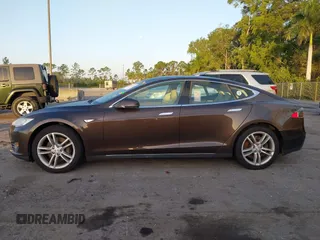 2014 Tesla Model S 60 z VIN 5YJSA1H19EFP51406, wystawiony jako IAAI lot #41561395 z przebiegiem Nie podano mil oraz . Historia ofert i sprzedaży dostępna na DreamBid. Obrazek 14.