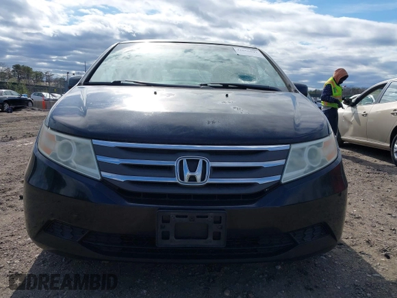 2011 Honda Odyssey EX with VIN 5FNRL5H4XBB011918, listed as a IAAI auction lot 42056043 with 201,821 mi miles and . Bid and sale history available at carsss.com. Image 12.