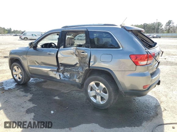 2013 Jeep Grand Cherokee Limited with VIN 1C4RJEBG2DC574924, listed as a Copart auction lot 49662945 with 154,830 mi miles and Salvage Title. Bid and sale history available at carsss.com. Image 2.