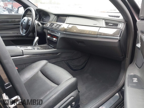 2015 BMW 7 Series 740i with VIN WBAYA6C54FG273188, listed as a IAAI auction lot 42563572 with 70,675 mi miles and . Bid and sale history available at DreamBid. Image 5.