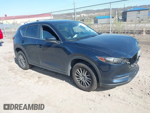 2019 Mazda CX-5 Touring with VIN JM3KFBCM8K0518806, listed as a IAAI auction lot 42038168 with 61,449 mi miles and . Bid and sale history available at DreamBid. Image 1.
